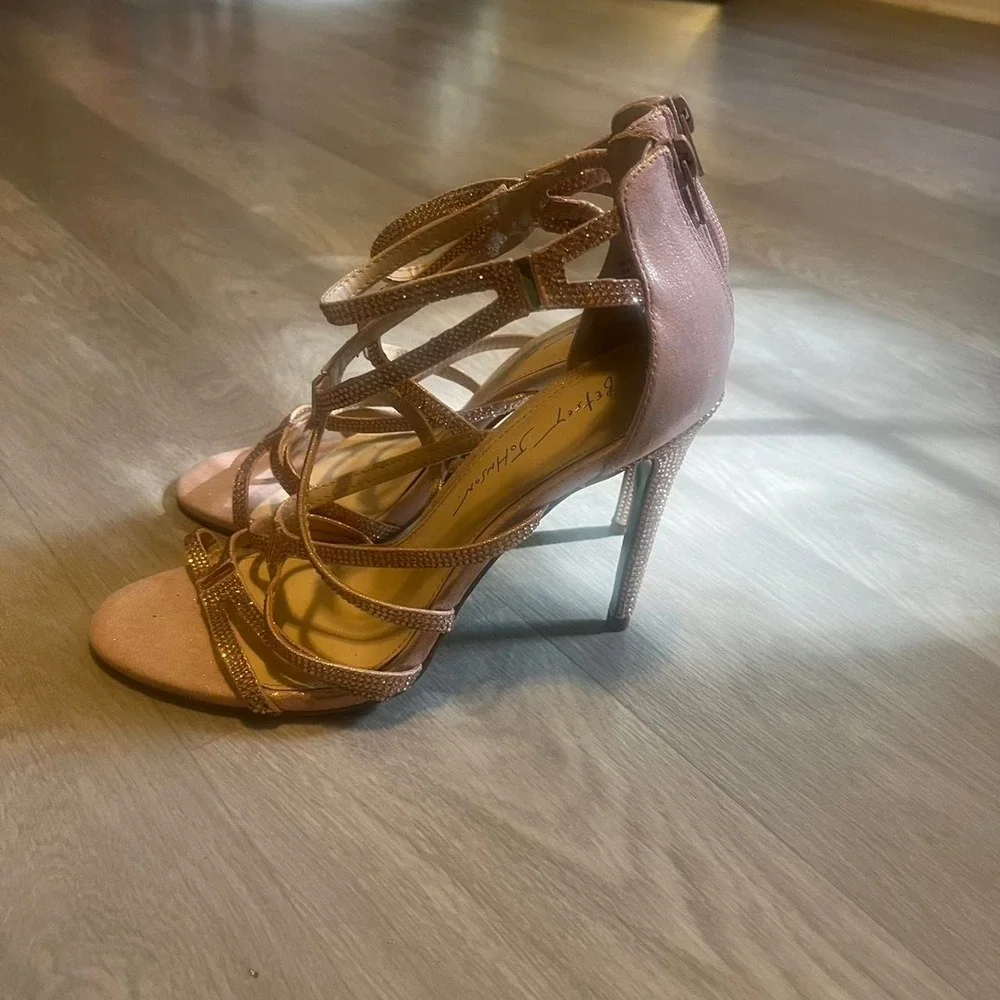 Betsy Johnson Rose gold strappy heels with rhinestones and blue bottom.